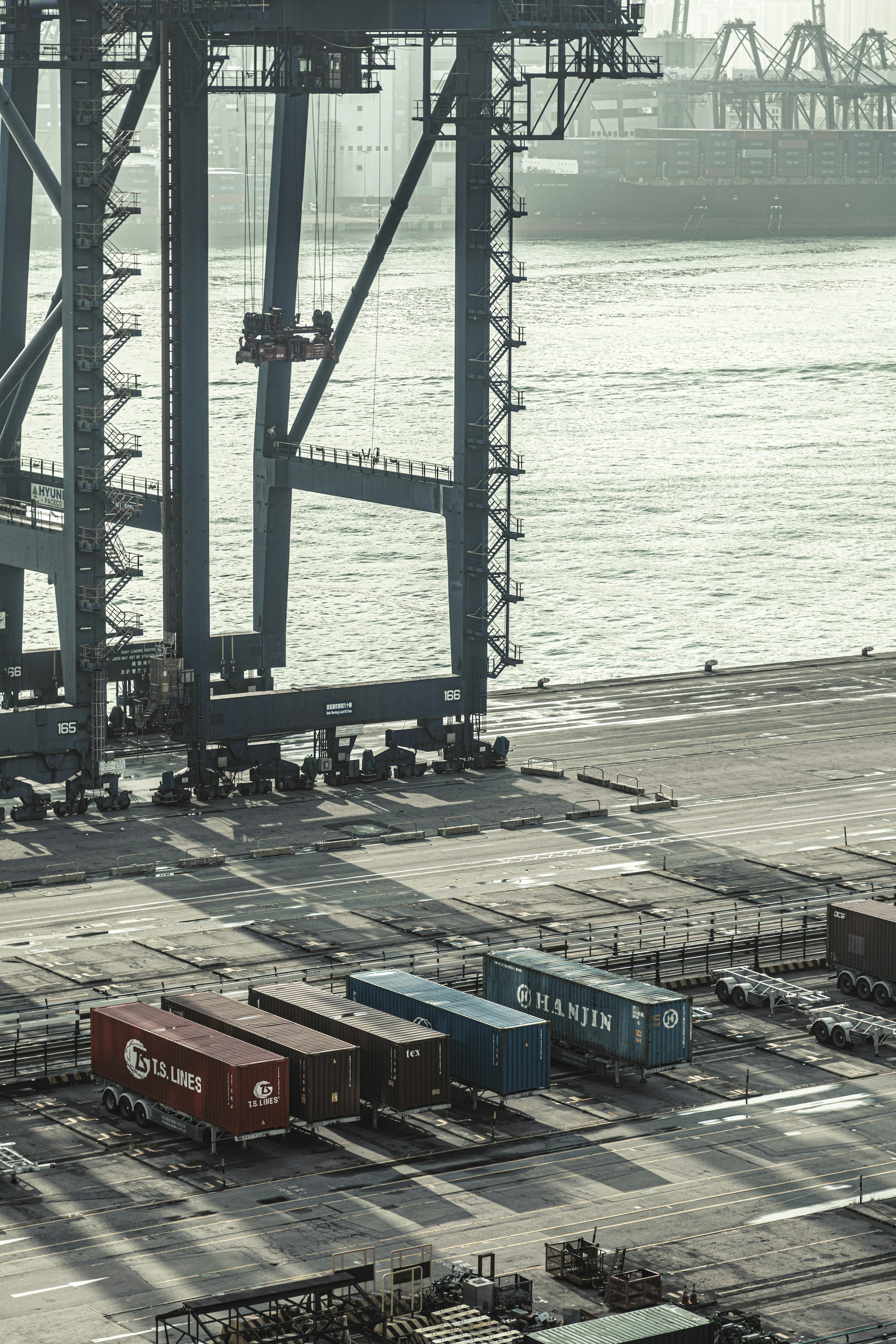 Container cranes and cargo-handling infrastructure at a seaport